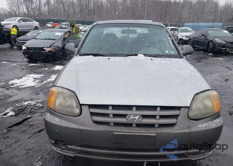 2005 Hyundai Accent Gls from USA, damaged, VIN KMHCG45C25U598381